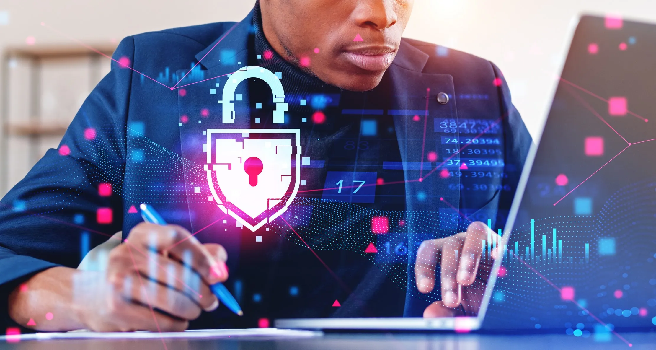 Professional working on a laptop showing a data protection interface